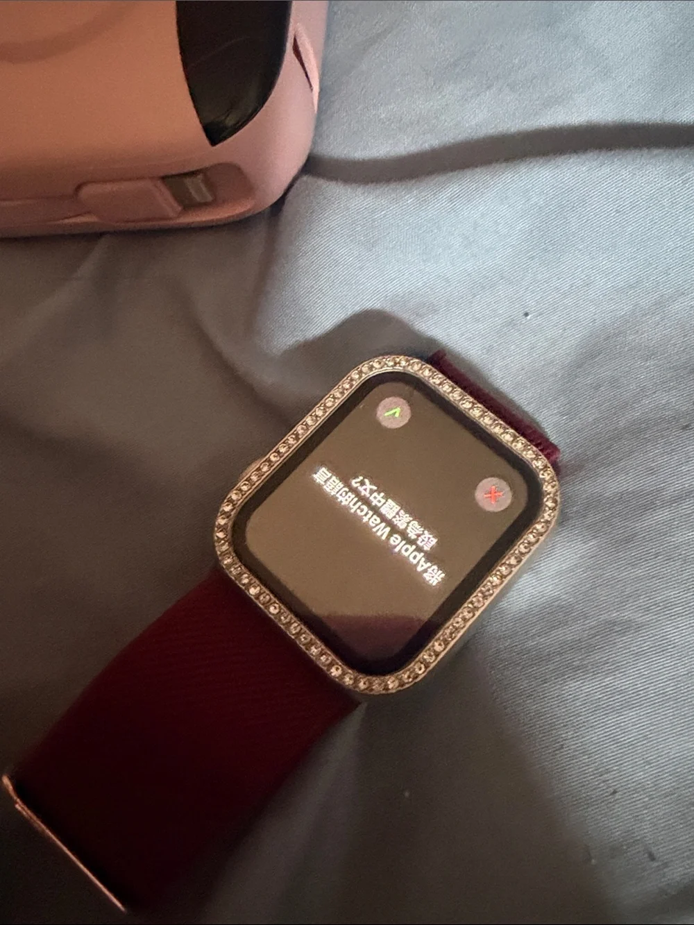 Apple Watch with Burgundy Woven Band, Pink Protective Case and Rhinestone Bezel